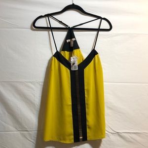 Yellow and black tank top with front beading.